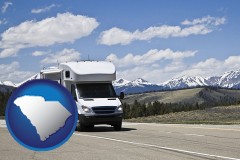 south-carolina map icon and recreational vehicle and snow-capped mountains