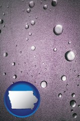 iowa map icon and water droplets on a shower door