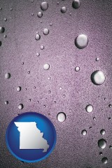 missouri map icon and water droplets on a shower door