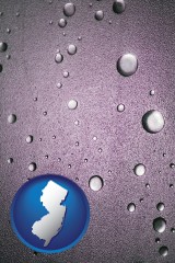 new-jersey map icon and water droplets on a shower door