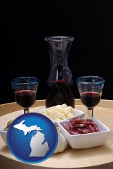 michigan map icon and tapas and red wine