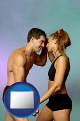 colorado map icon and a couple wearing black swimsuits