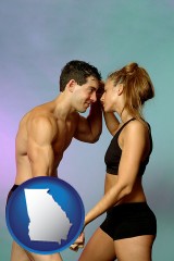 georgia map icon and a couple wearing black swimsuits