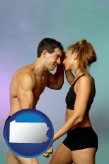 pennsylvania map icon and a couple wearing black swimsuits