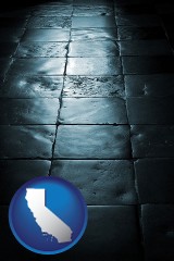 california map icon and an old tile floor