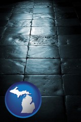 michigan map icon and an old tile floor