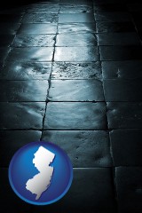 new-jersey map icon and an old tile floor