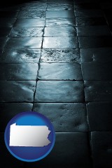 pennsylvania map icon and an old tile floor