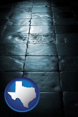 texas map icon and an old tile floor